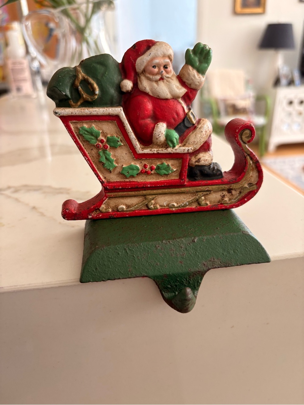 Green and Red Santa Sleigh Holiday Cast Iron Stocking Hanger
